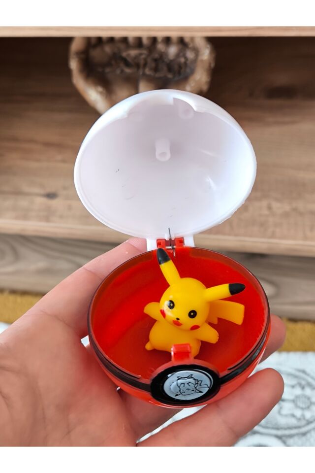 Pokemon topu ve Pokemon figür 1 adet . Poketopu ve Pokemon figür , pokeball poketop